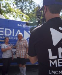 LMC Media crew interviewing Mayor Lorraine Walsch in front of LMC Van