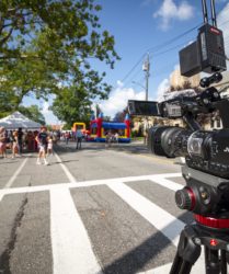 Camera filming Larchmont Day