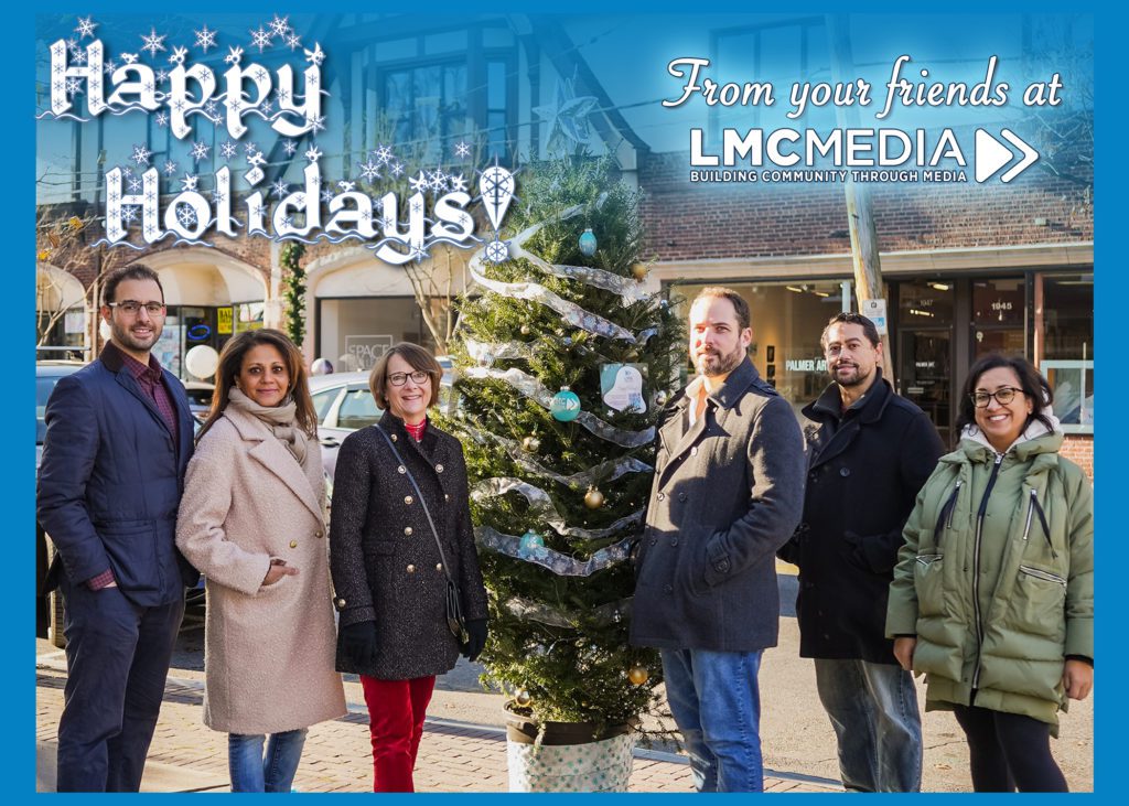 LMC Media Staff Holiday Image in front of LMC decorated Larchmont Christmas Tree